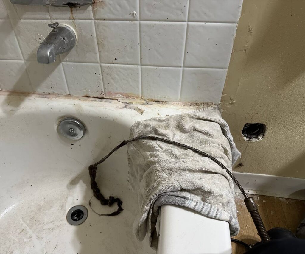 Clogged bathroom sink in a Seattle home requiring professional drain cleaning services seattle