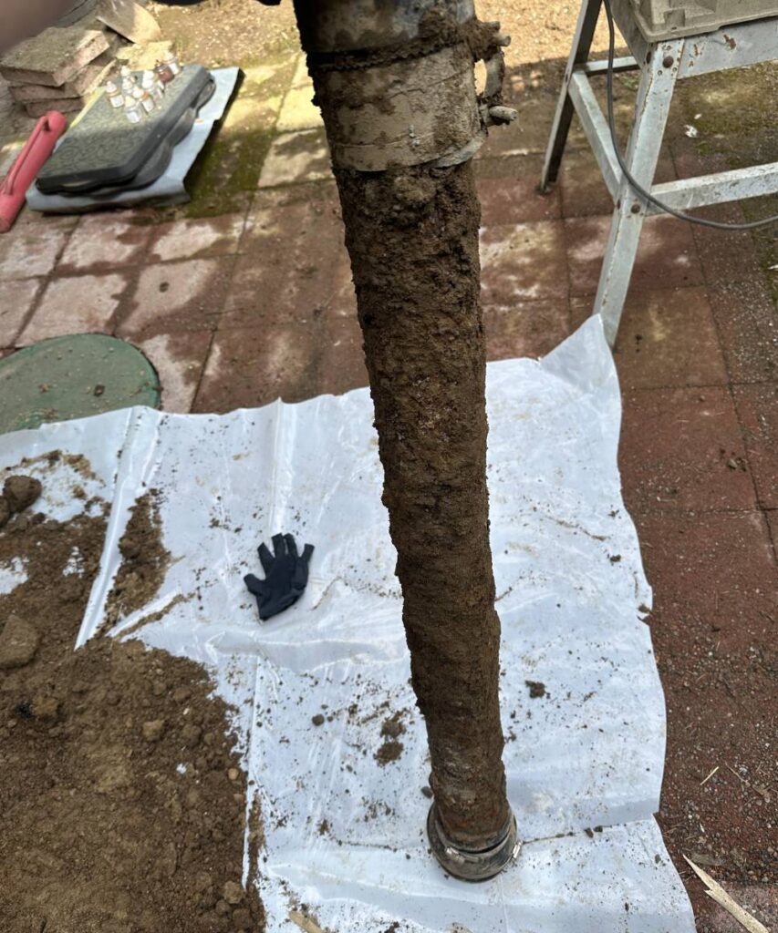 Damaged sewer pipe – A close-up of a cracked or corroded sewer pipe illustrating the need for predictive analytics in sewer repair.
