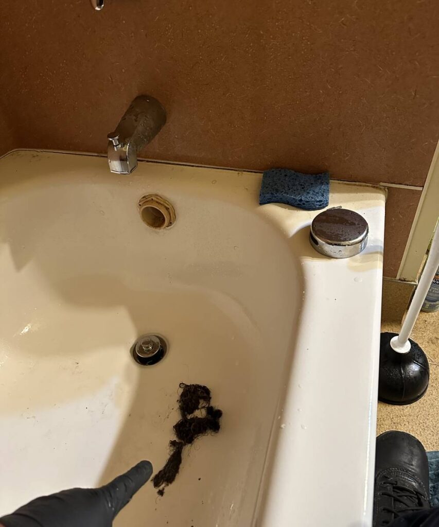 Seattle Airbnb rental bathroom sink: A modern bathroom sink in a Seattle Airbnb rental, highlighting the importance of drain maintenance.