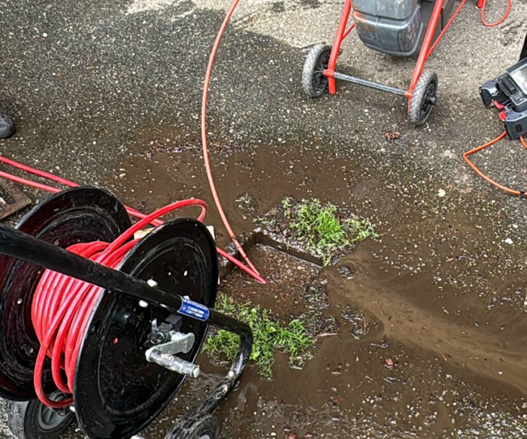 Professional hydro jetting machine cleaning pipes with high-pressure water