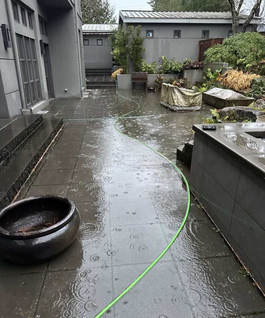 Licensed KnightRooter plumber performing hydro jetting in a Seattle residence.
